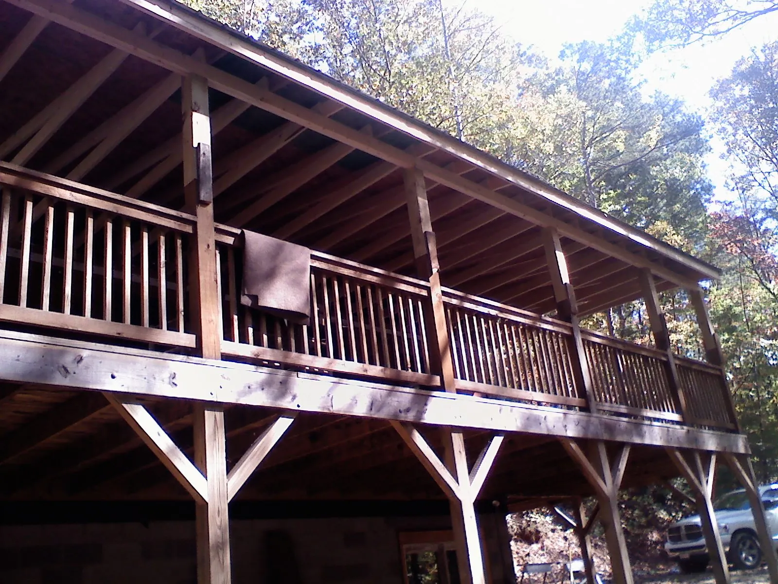 Timber framing under a new elevated porch and deck — Roof Leak Repair in Wynne by Roofing Brothers